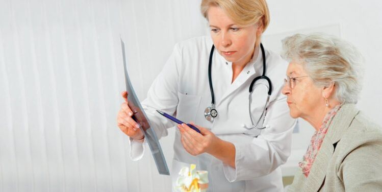 doctor prescribes treatment for low back pain